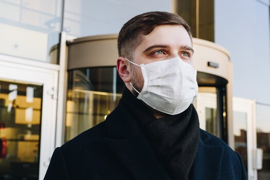A man in a medical face mask